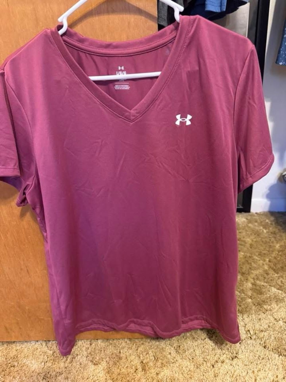 Under Armour Women's V-Neck Performance Tee in Berry